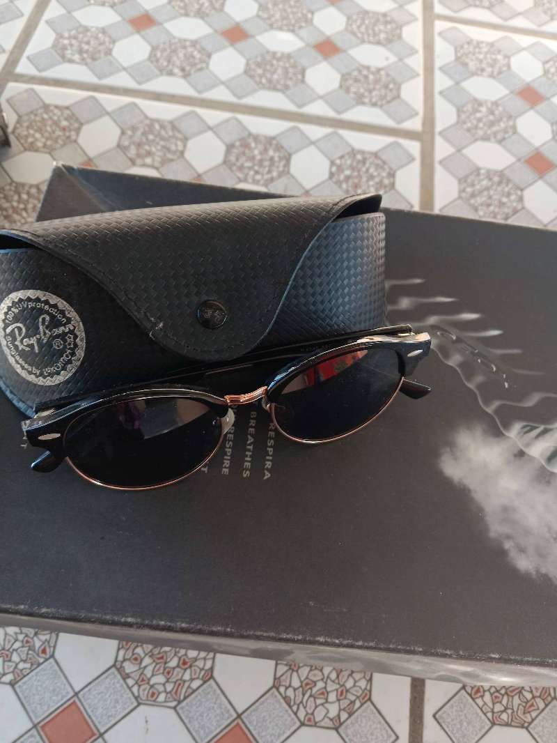Lunettes soleil prada - Miniature 3