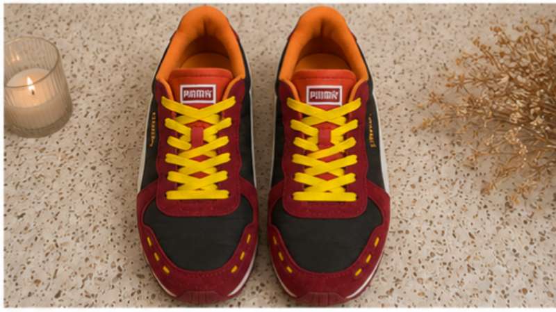حذاء Puma رياضي مختلف الألوان ( أحمر ، أسود و أصفر) بمقاس 39 - Miniature 2